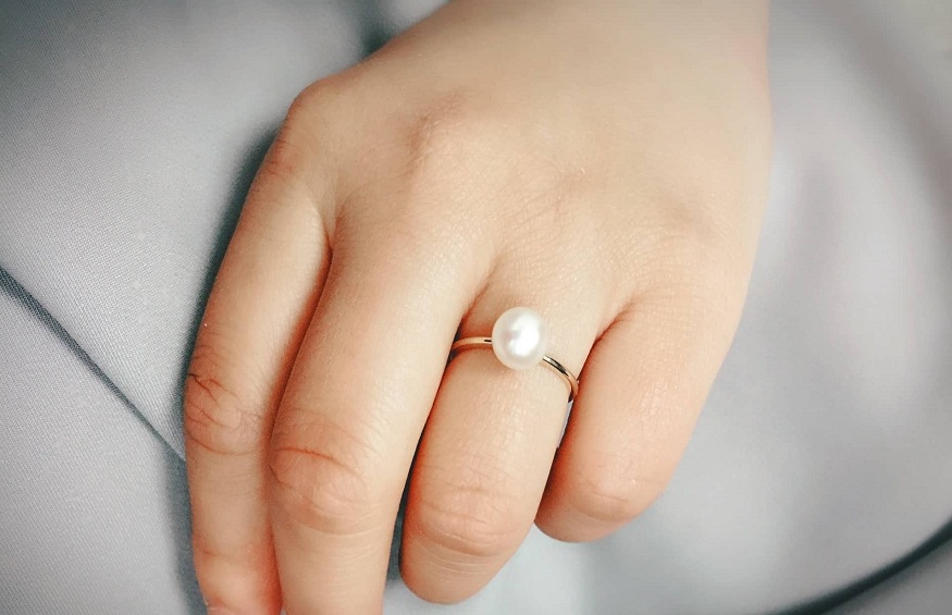 On which finger should I wear pearl ring and why?